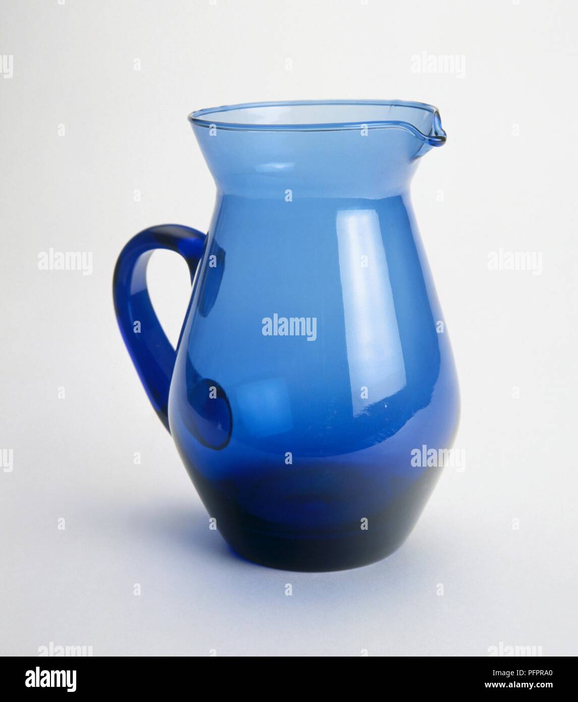 Blue glass jug Stock Photo Alamy