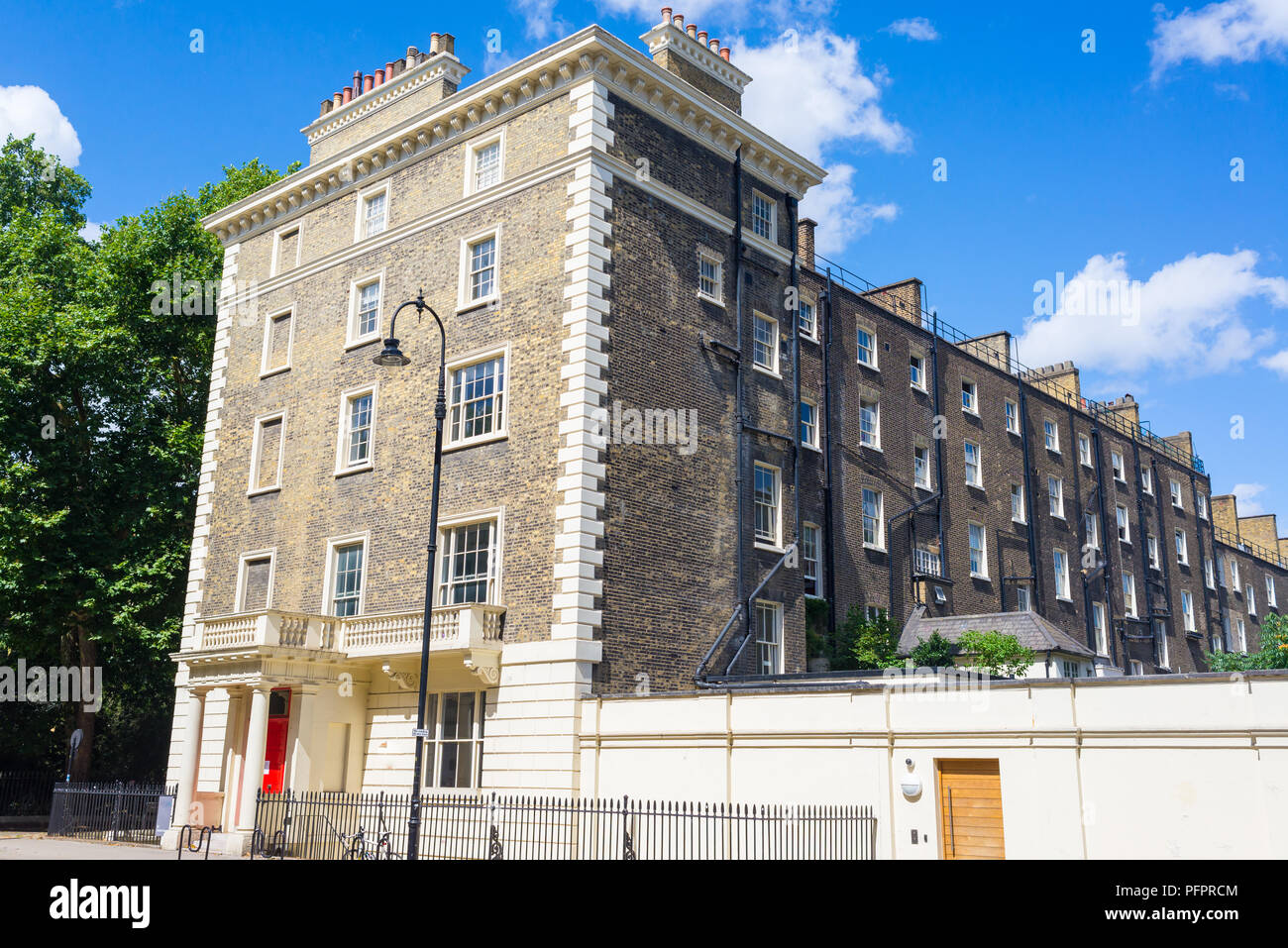 Exterior of residential apartment building made in yellow