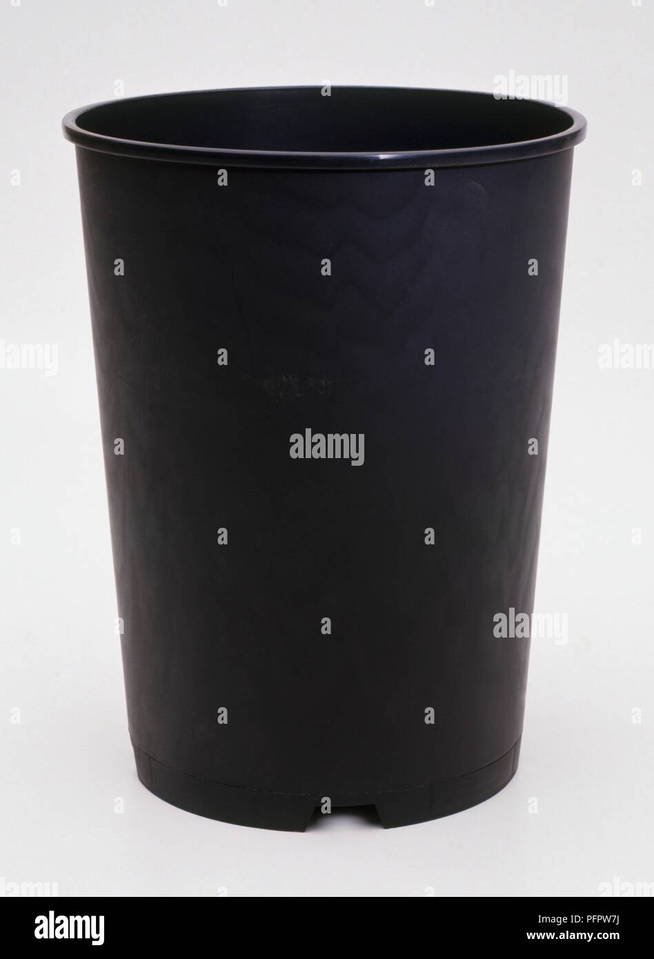 Long tom plant pot used for deeprooted plants Stock Photo Alamy