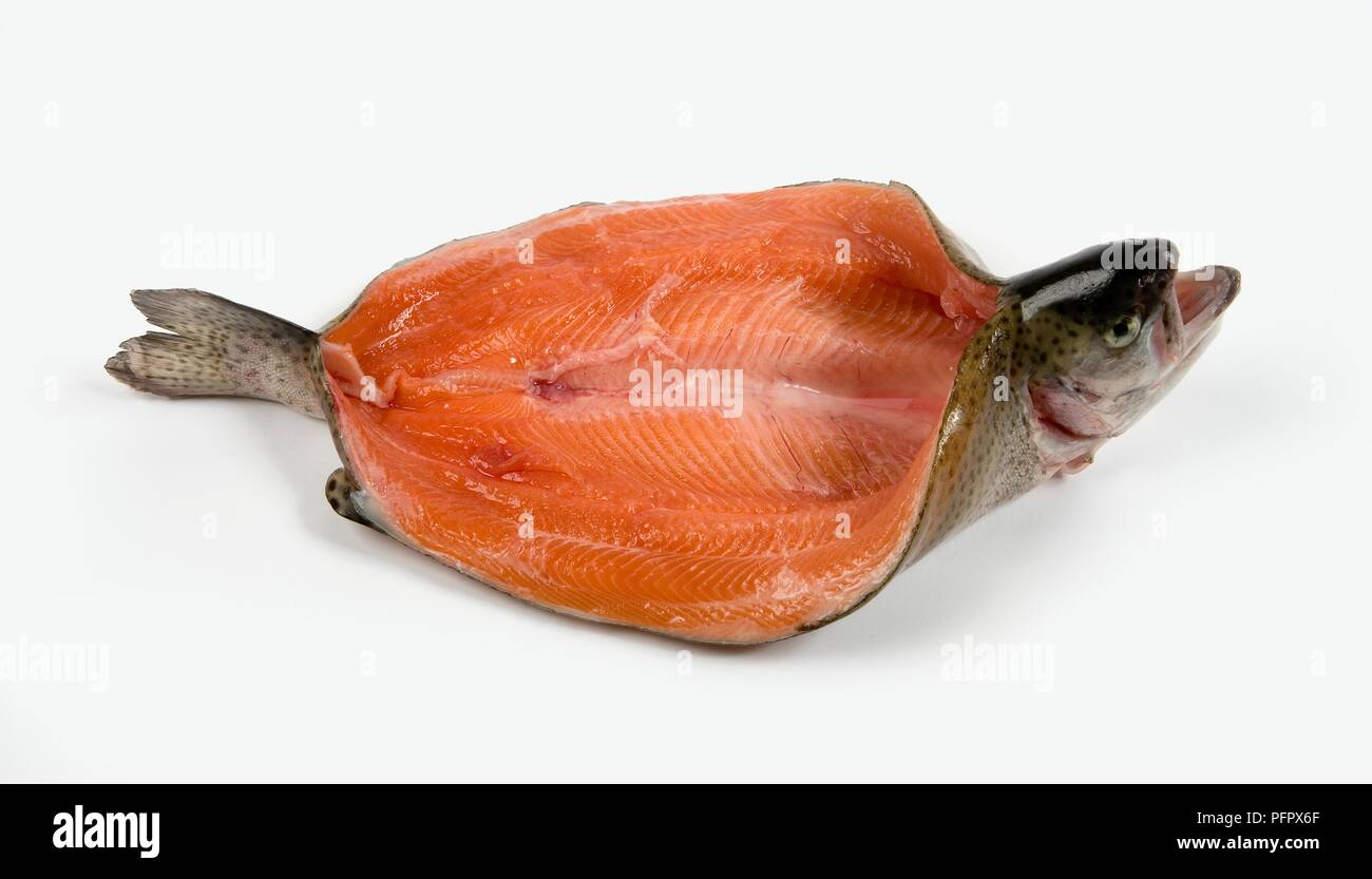 Whole filleted rainbow trout Stock Photo Alamy