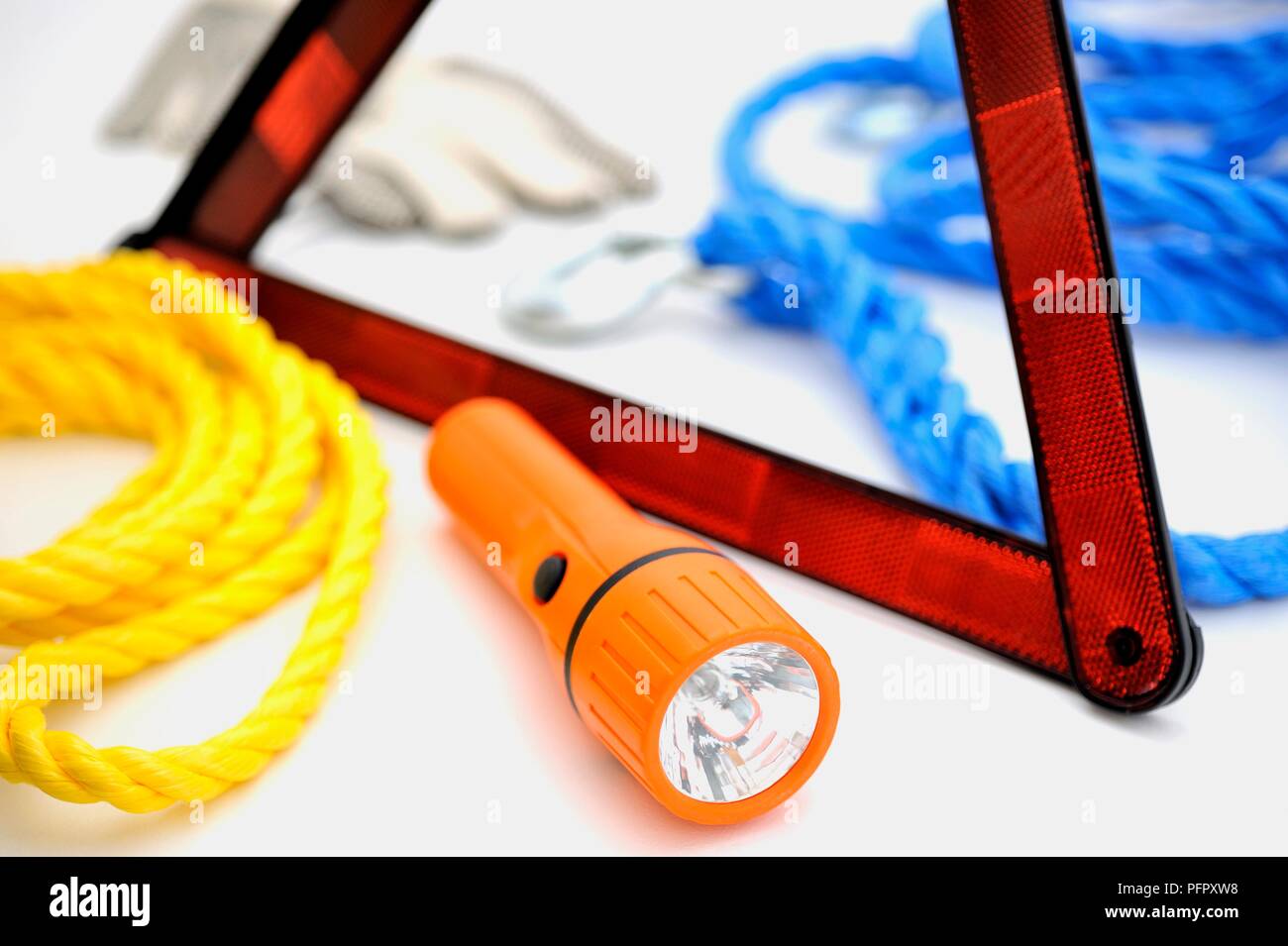 Emergency supplies, including torch, ropes, reflector Stock Photo