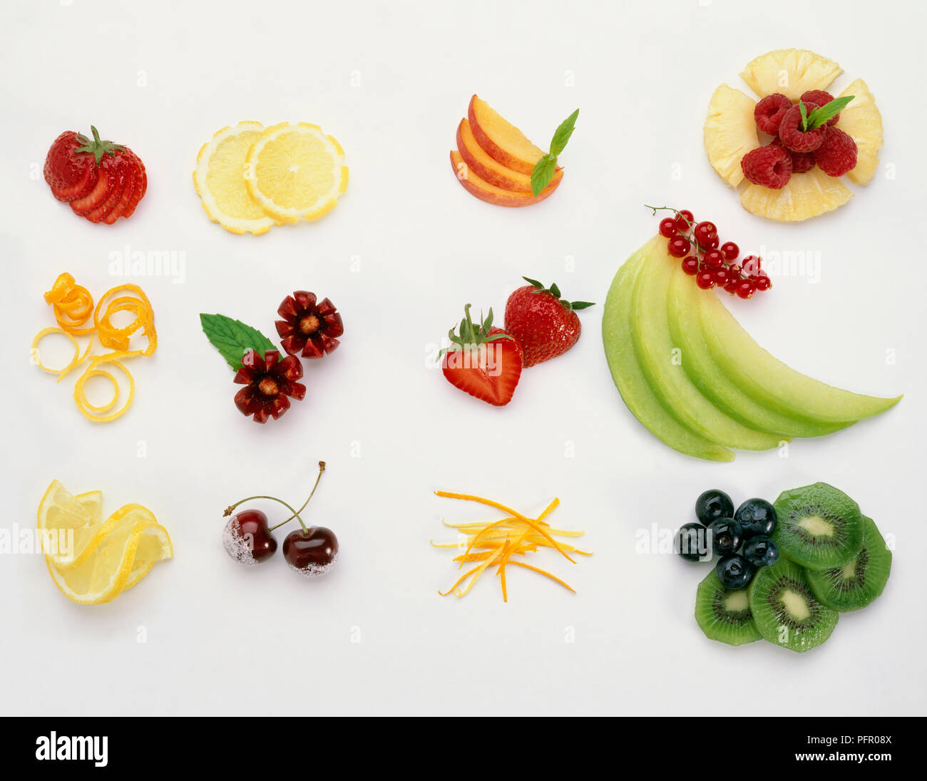 Various fruits cut decoratively Stock Photo - Alamy