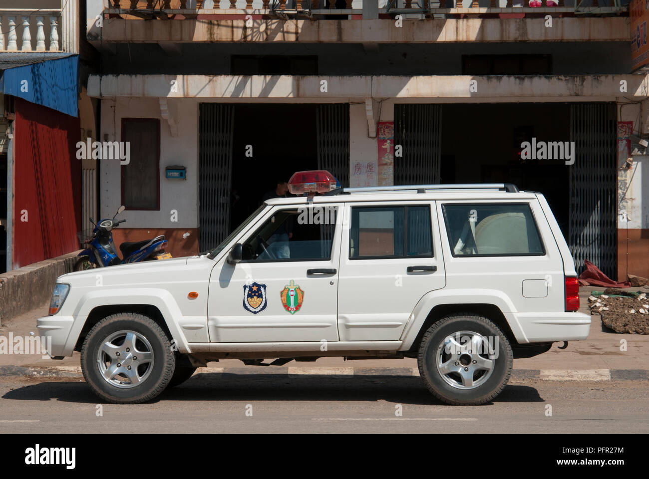 Laos, Northern Laos, Oudomxai, police car parked in street Stock Photo