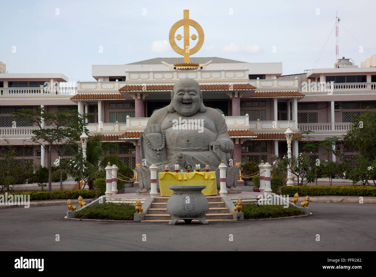 Cambodia, Phnom Penh, Buddha statue in front of a Chinese temple Stock Photo