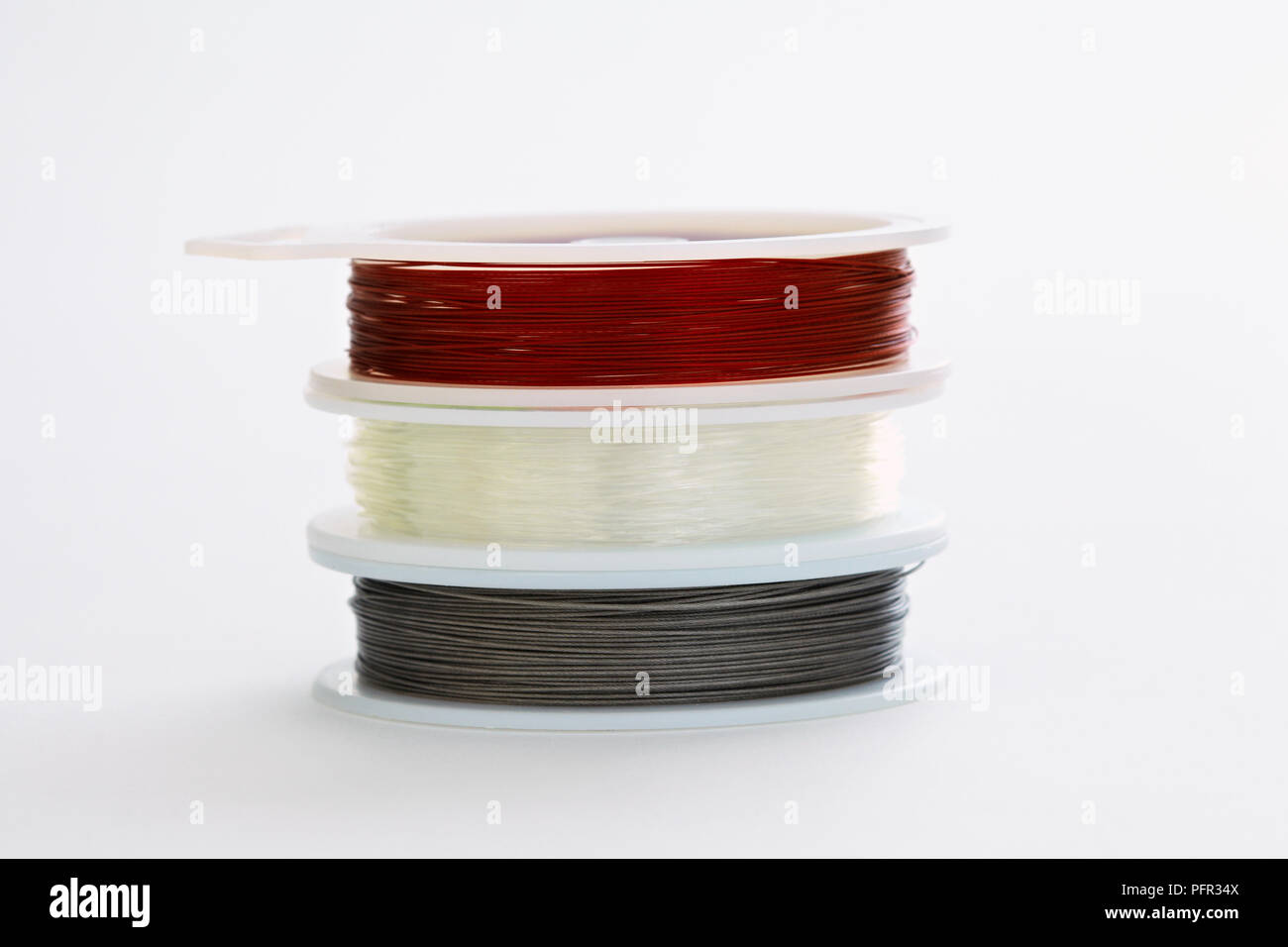 Rolls of bead stringing wire Stock Photo Alamy