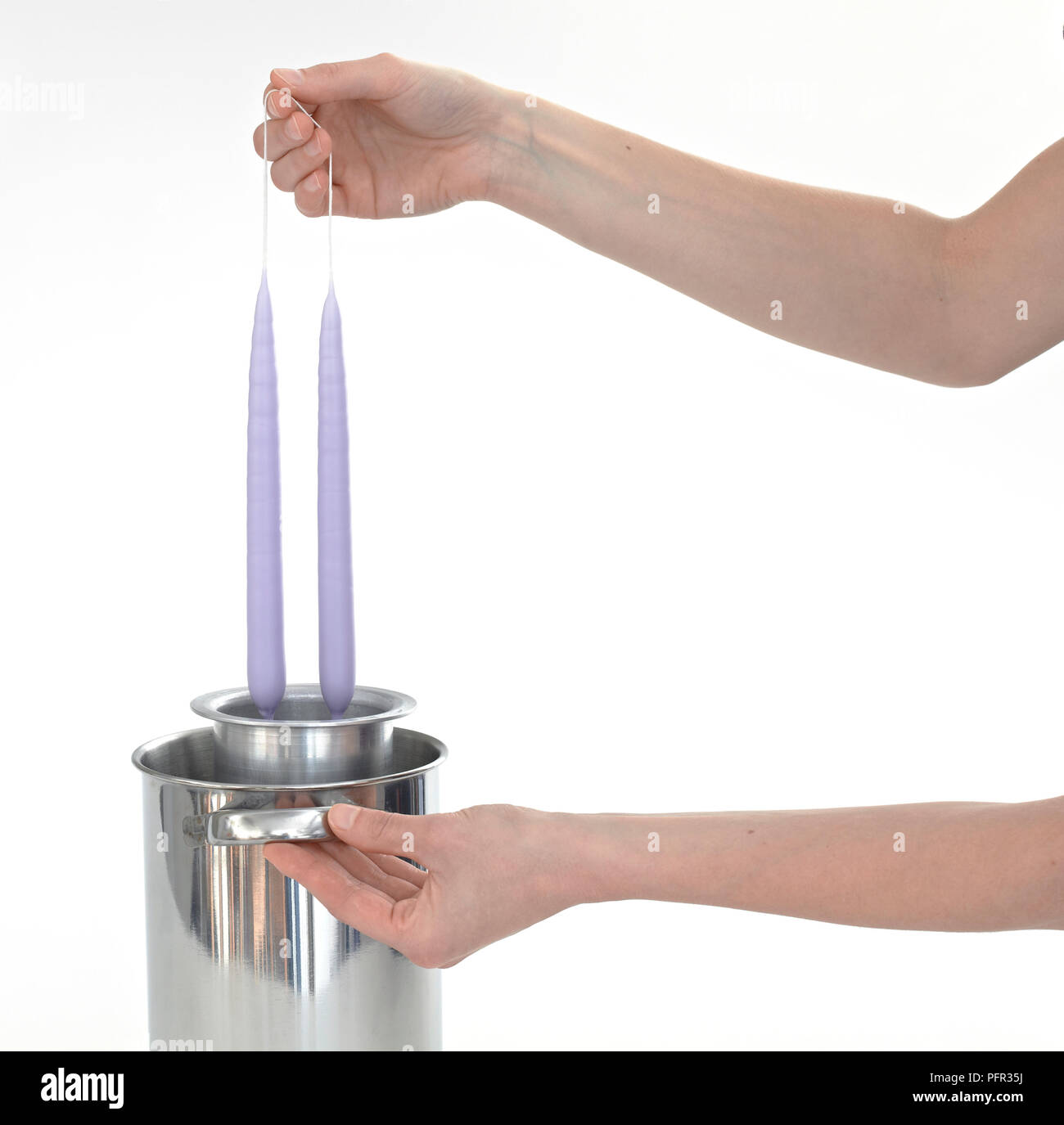 Hand dipping candles hires stock photography and images Alamy