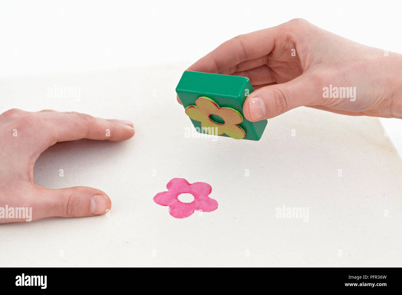 Using block printing (woodblock printing) technique to print flower