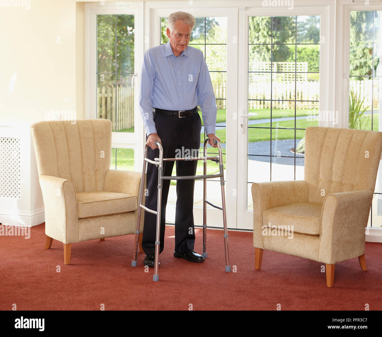 Man using zimmer frame hires stock photography and images Alamy