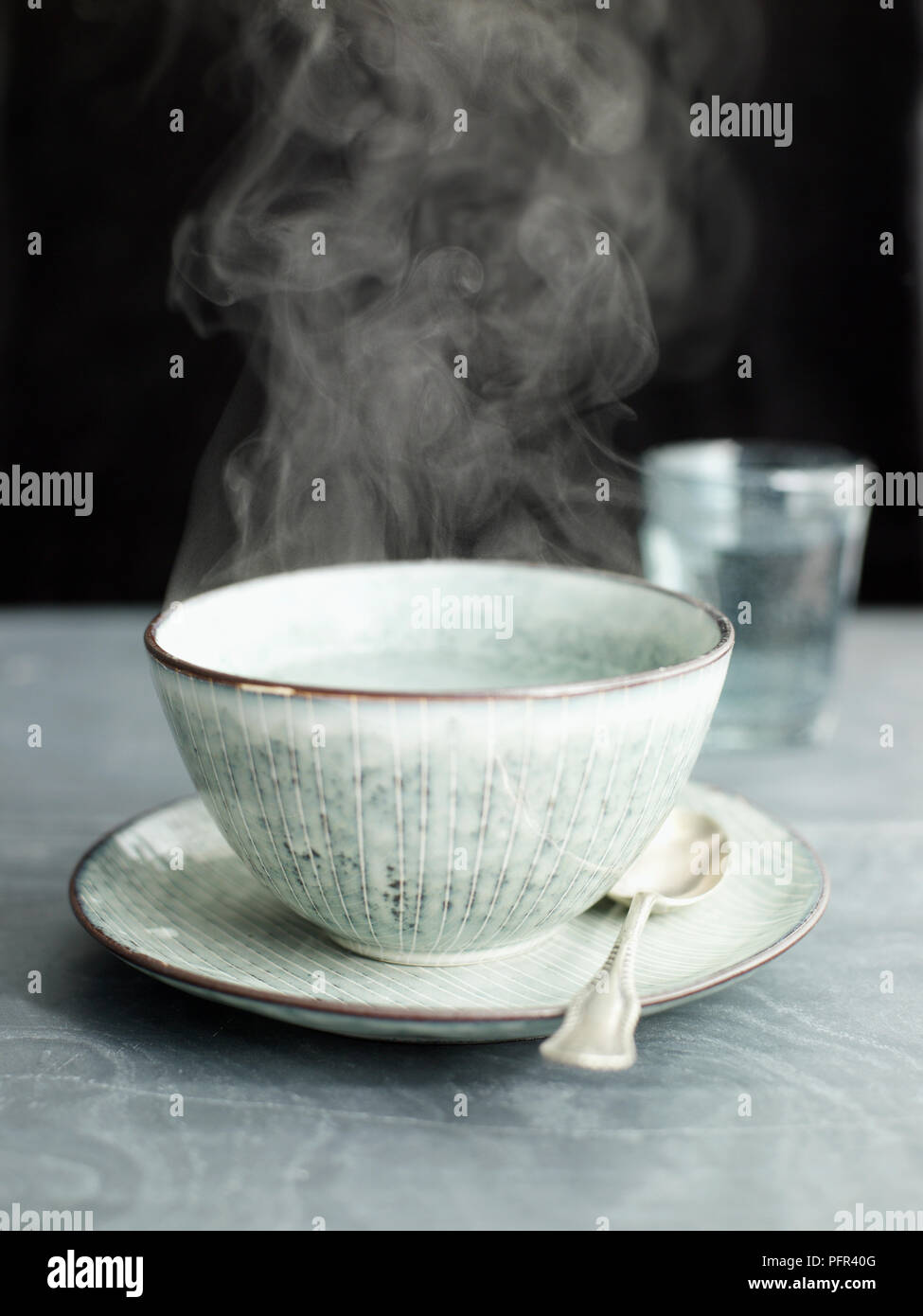 Bowl of hot steaming water Stock Photo