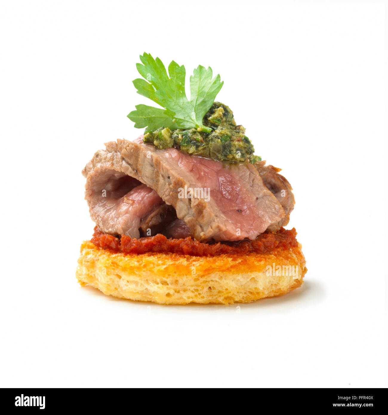 Grilled beef croute with salsa verde Stock Photo