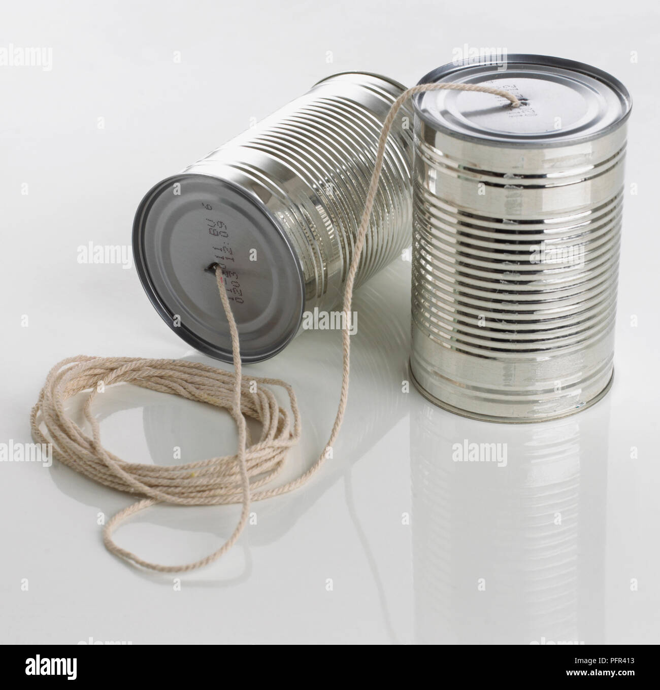 Tin can telephone Stock Photo
