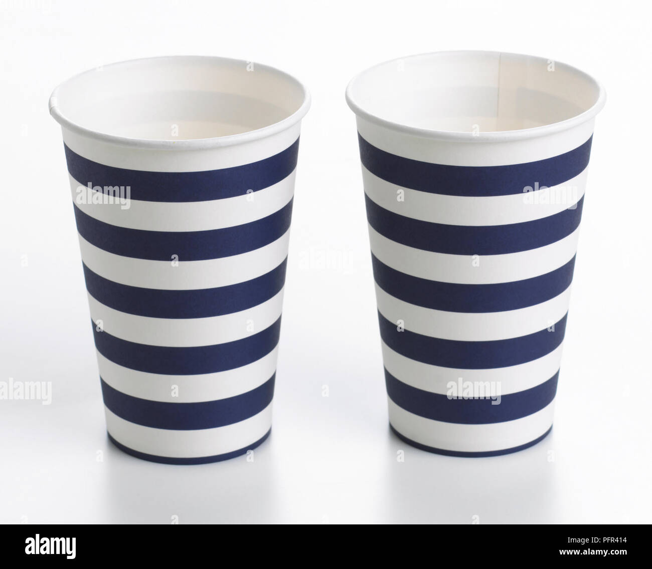 Two blue and white stripy paper cups Stock Photo - Alamy