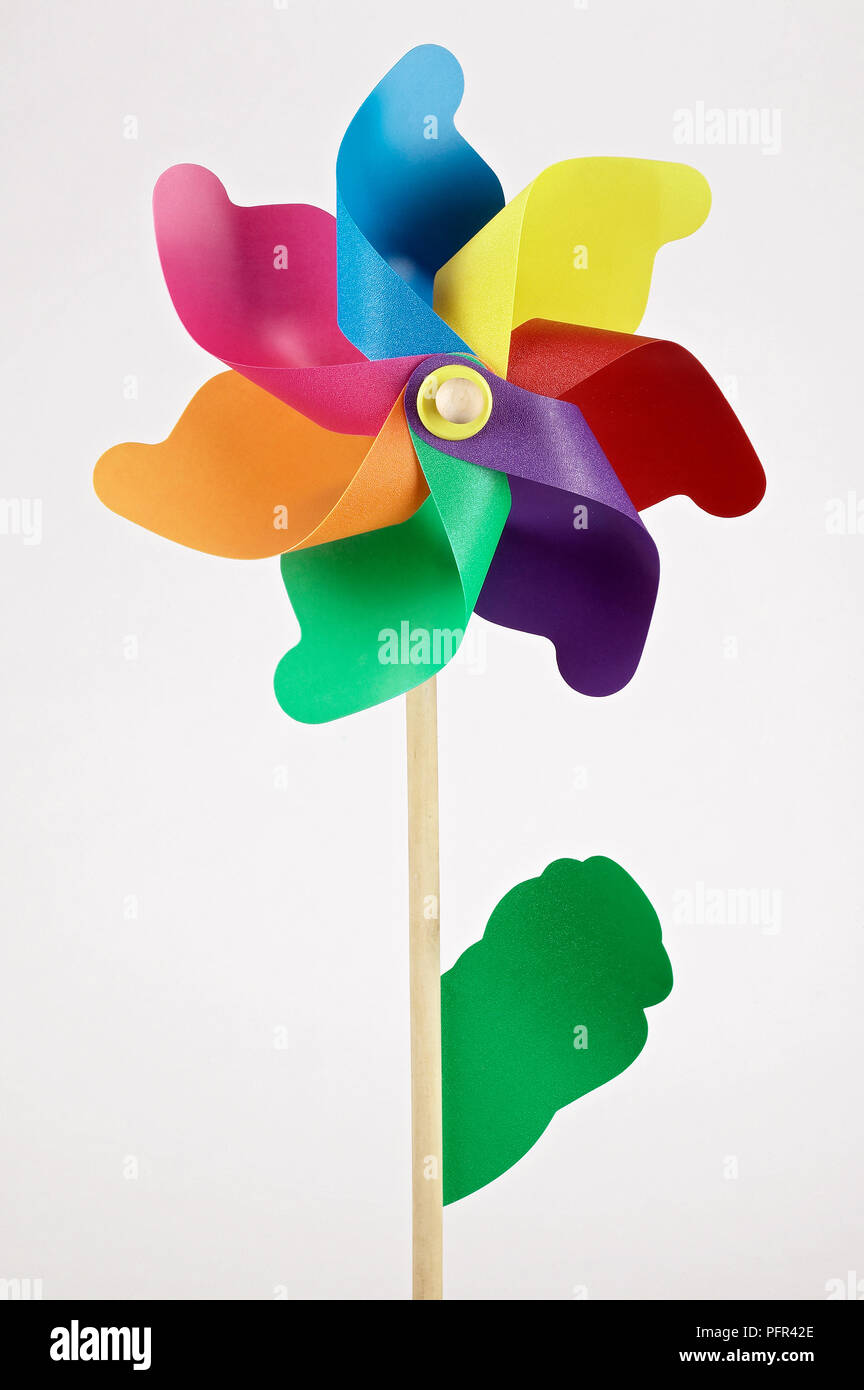 Rainbow-coloured flower pinwheel Stock Photo