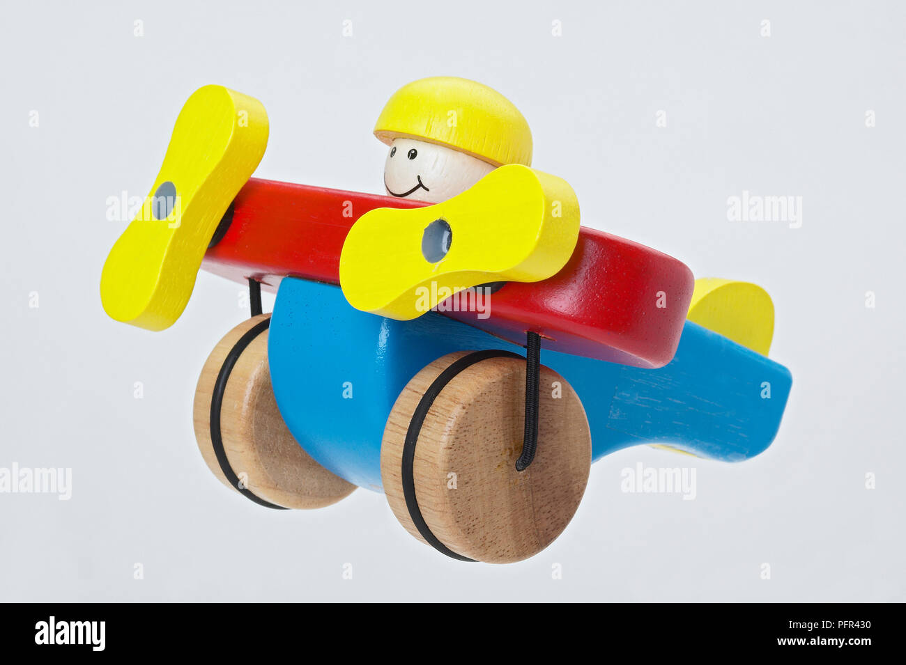 Wooden airplane and pilot toy Stock Photo