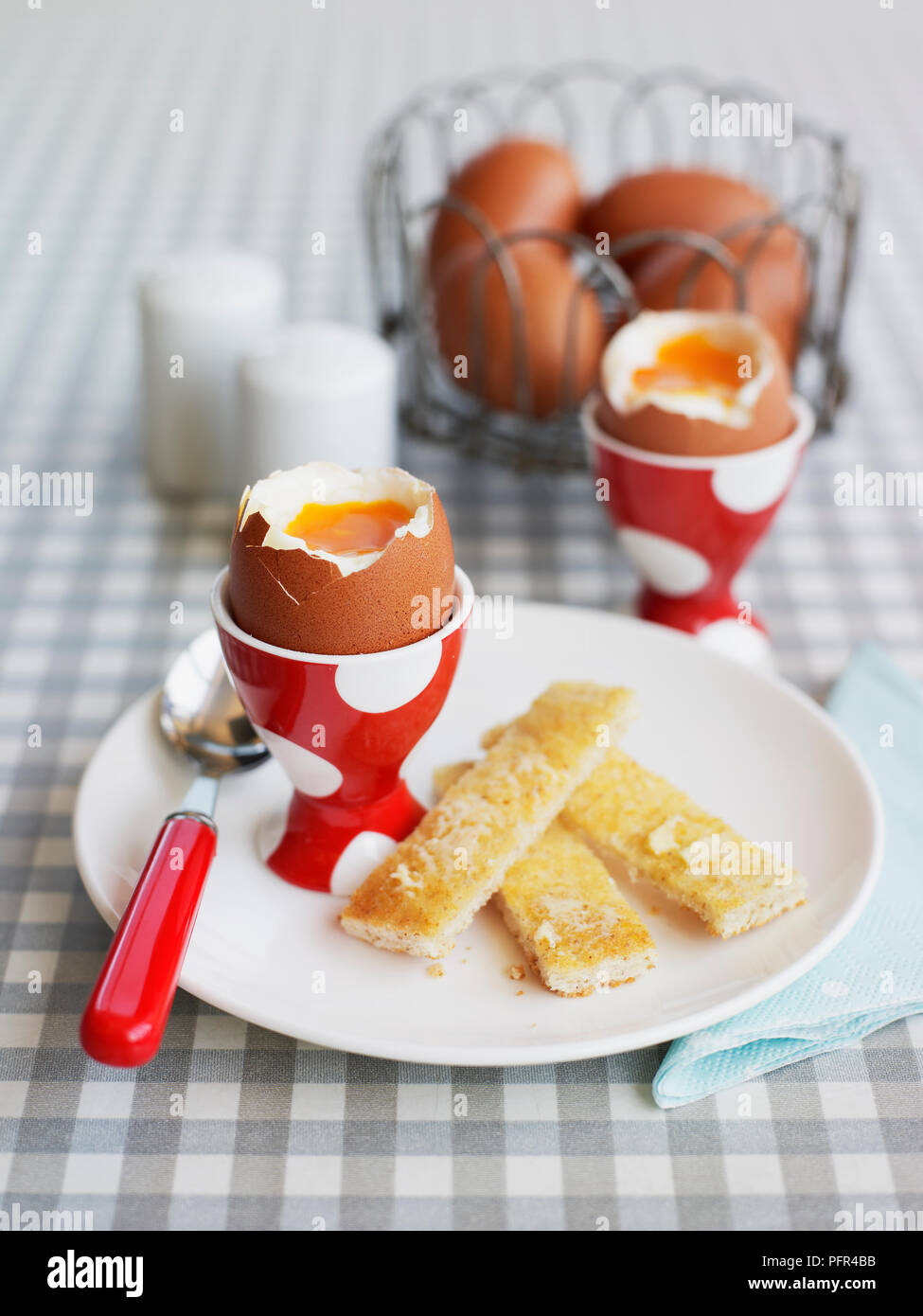 Boiled egg with soldiers Stock Photo