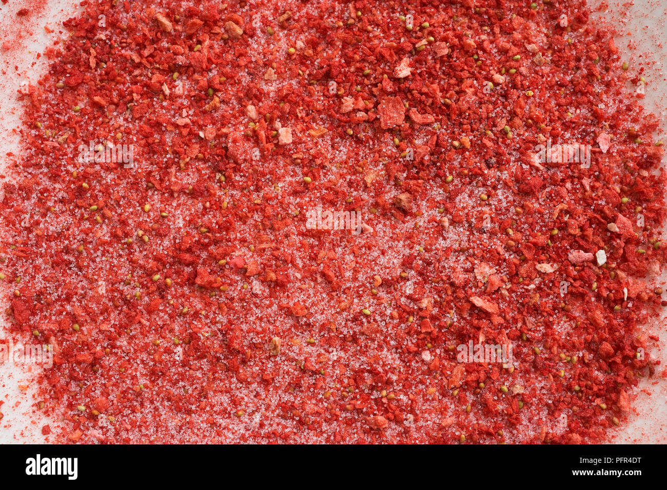 Dried strawberries, crushed and mixed with icing sugar Stock Photo