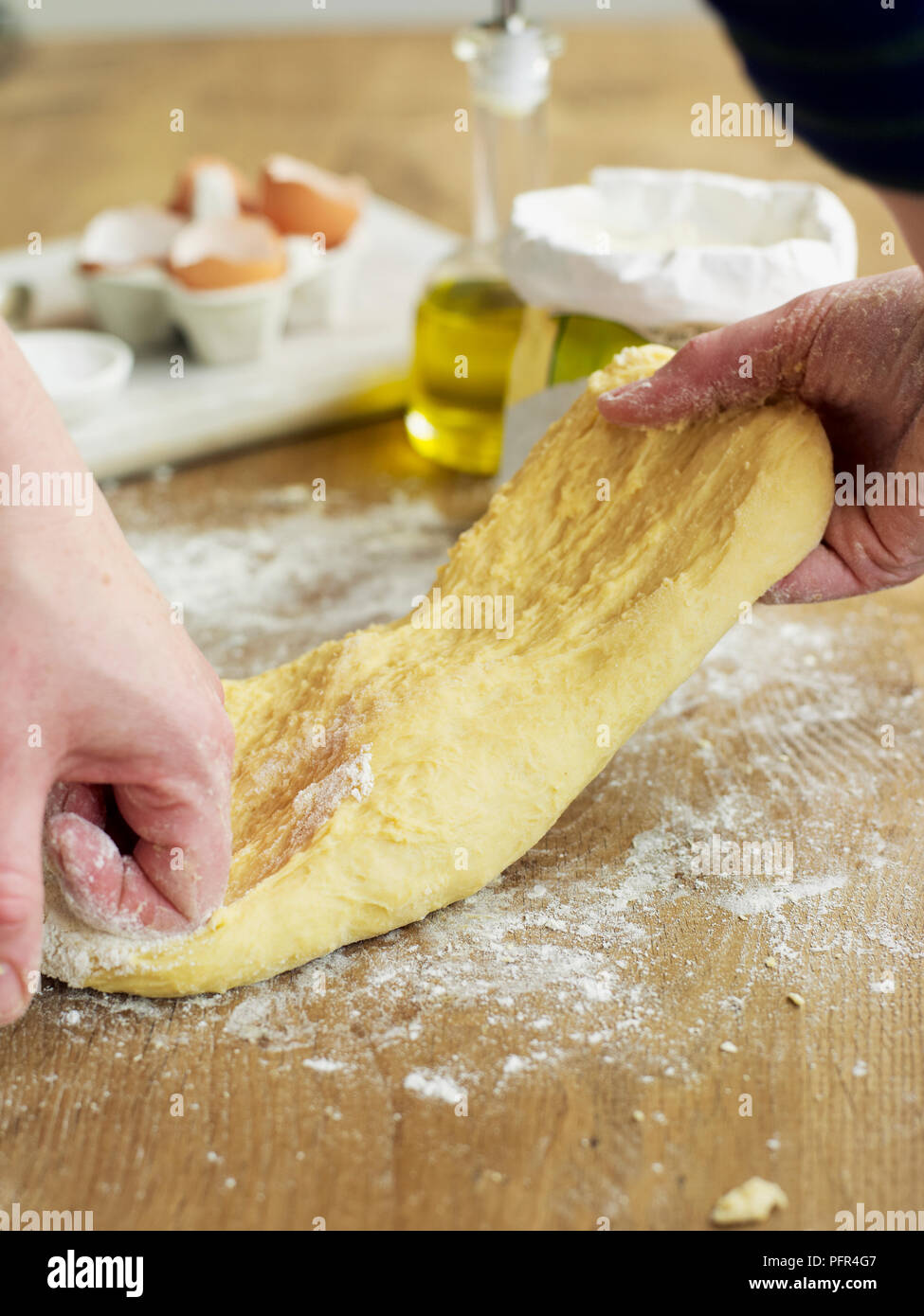 Kneading pasta dough Stock Photo