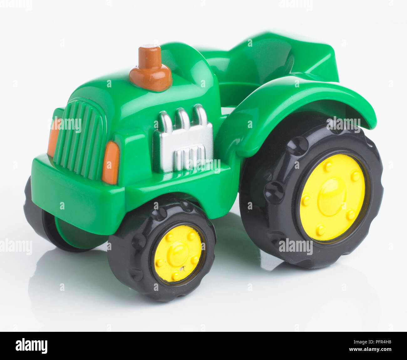 Plastic toy tractor Stock Photo