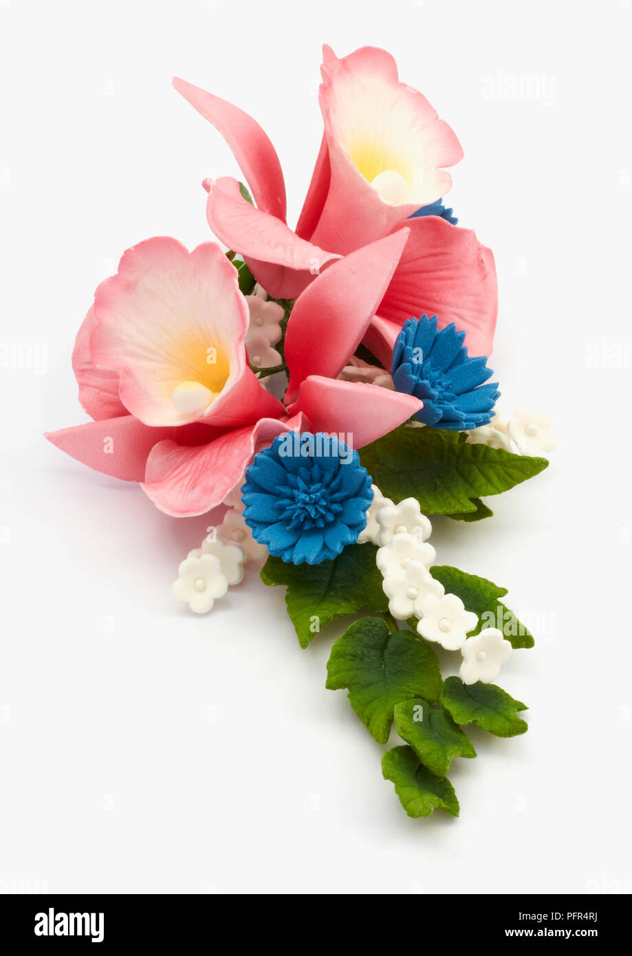 Orchids, cornflower and baby's breath cake decorations, edible Stock Photo