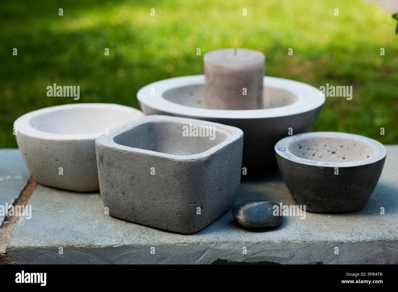 Concrete bowls for candles Stock Photo