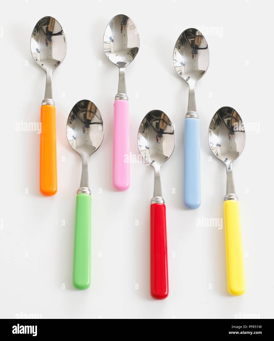 6 colourful teaspoons Stock Photo