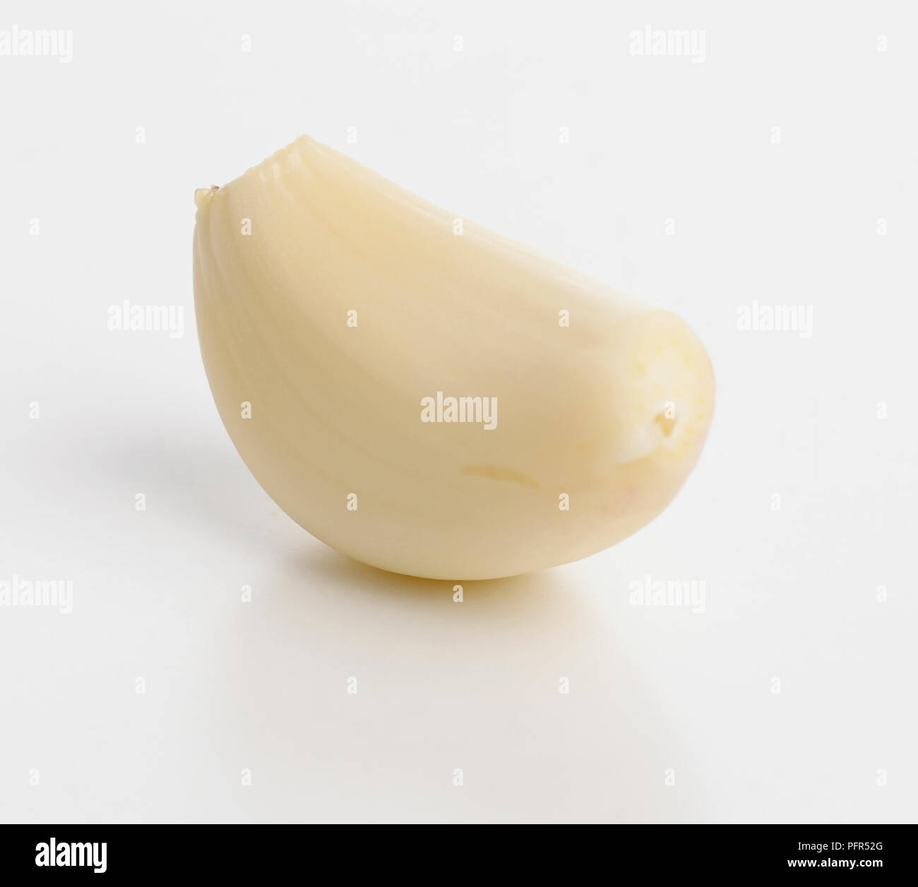Peeled clove of garlic Stock Photo