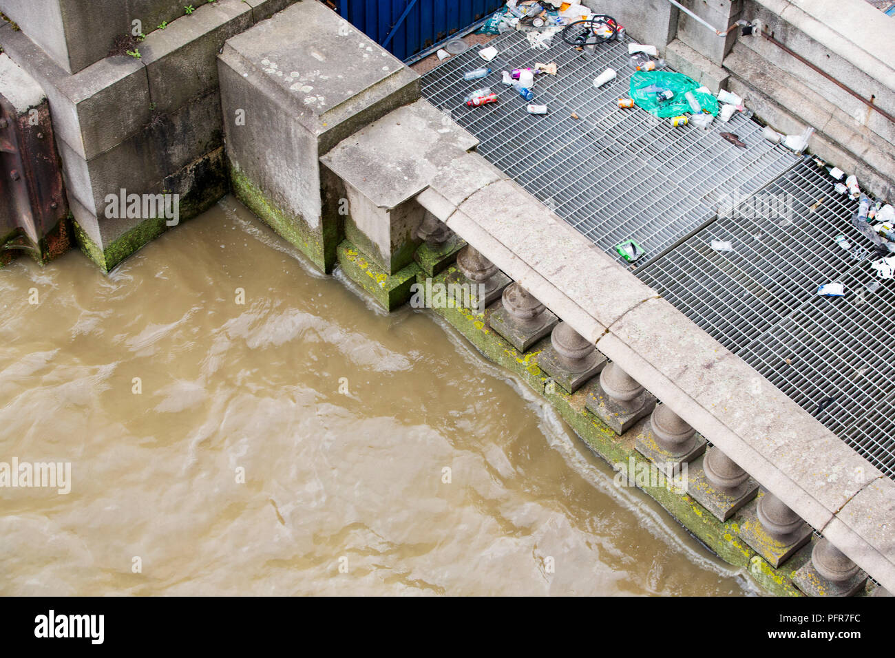 The river Thames at high tide, showing how vulnerable London is too flooding from storm surge and sea level rise. At high tide the water is higher tha Stock Photo