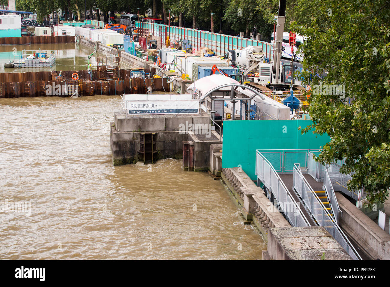 The river Thames at high tide, showing how vulnerable London is too flooding from storm surge and sea level rise. At high tide the water is higher tha Stock Photo