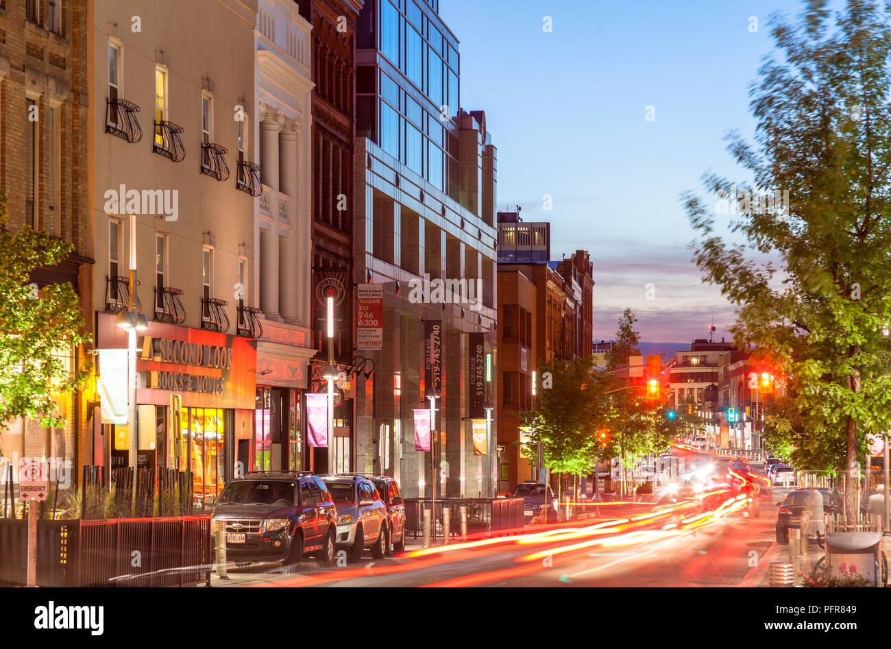 Historical buildings along King Street West at dusk in downtown Kitchener, Ontario, Canada. Stock Photo