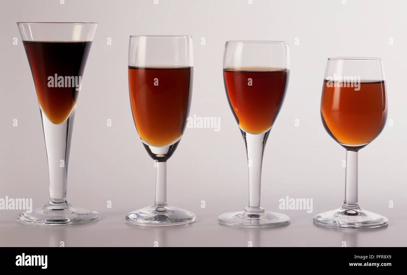 Glasses of madeira wine in a row Stock Photo Alamy