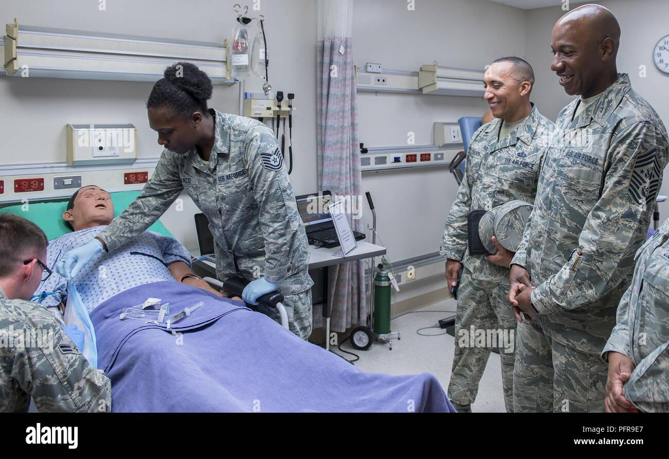 Chief Master Sgt. of the Air Force Kaleth O. Wright watches as 96th