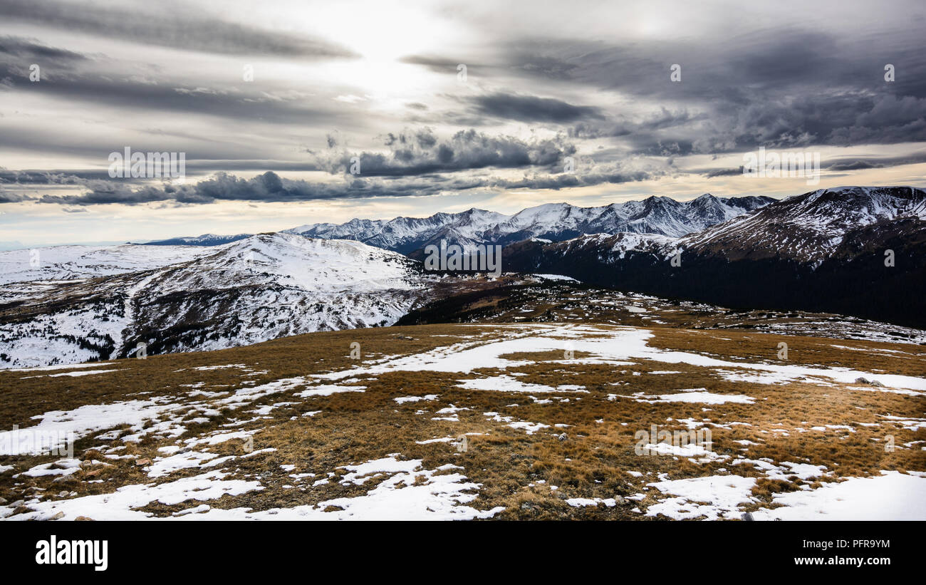 Dramatic Snow capped mountain vista Stock Photo
