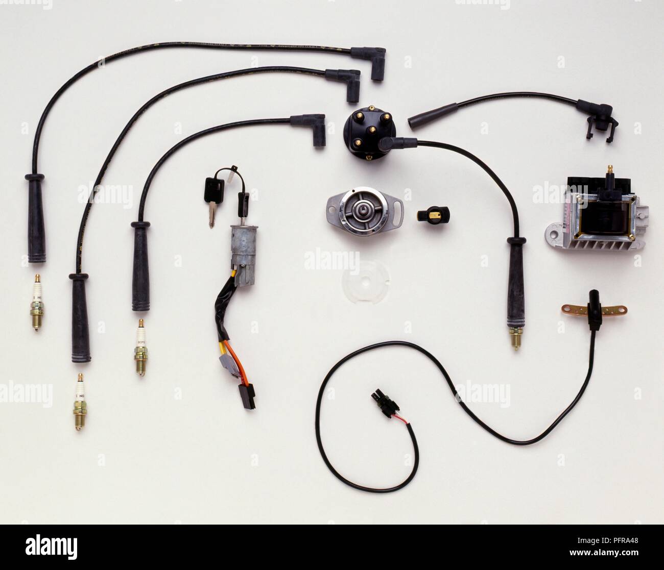 Expanded view of parts for automatic electronic ignition system, 1991 Stock Photo Alamy