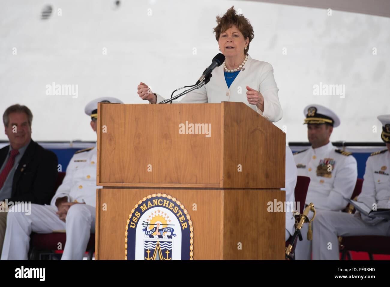 NH (May 26, 2018)  USS Manchester's (LCS 14) sponsor, Sen. Jeanne Shaheen (D-NH), gives remarks during the commissioning ceremony of the Independence-variant littoral combat ship USS Manchester (LCS 14). Manchester is the 12th littoral combat ship to enter the fleet and the seventh of the Independence variant. The ship is named for the city of Manchester, New Hampshire and is assigned to Naval Surface Forces, U.S. Pacific Fleet. Stock Photo