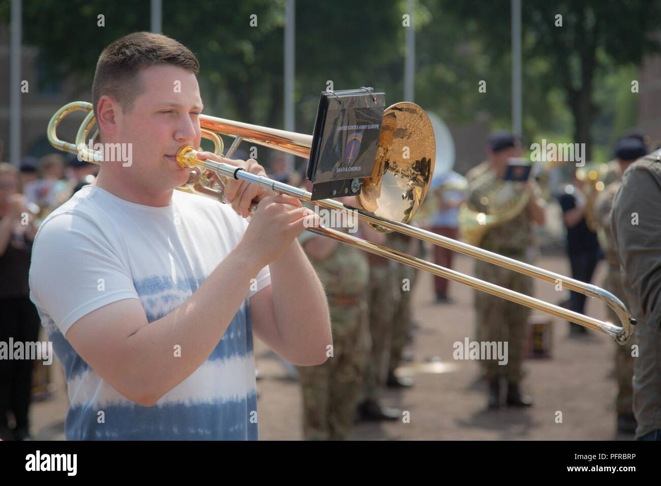 Spc Patrick Weiss rehearses alongside the international trombonists for the Citadelle 350 anniversary military show.  US Army Stock Photo