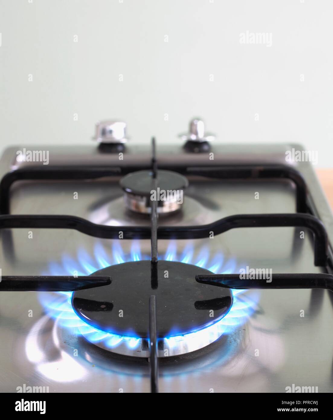 Gas hob with flame alight Stock Photo Alamy