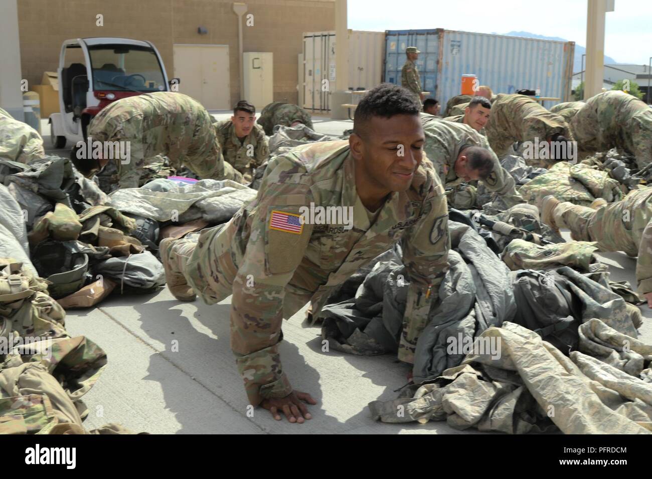 1st Squadron, 11th Armored Calvary Regiment Troopers do pushups in