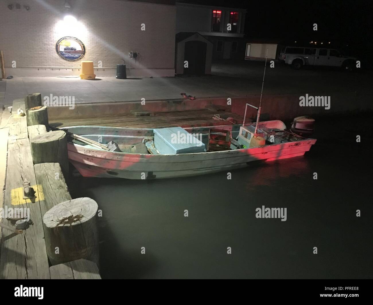 A lancha boat floats by a pier in southern Texas waters after its seizure  by Coast Guard law enforcement crews on Mar. 11, 2018. Lanchas are  frequently used to transport illegal narcotics