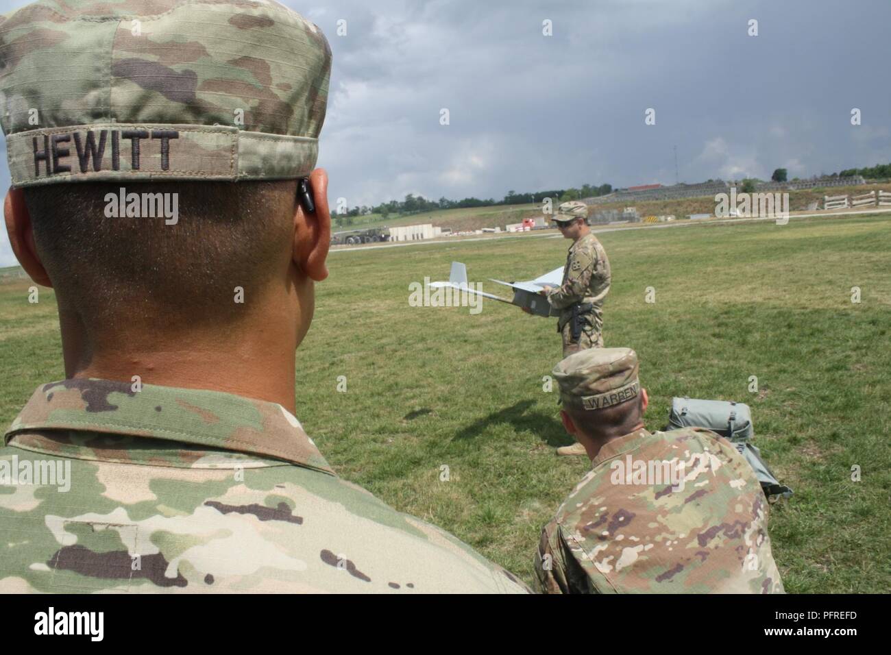Sgt. Jason R. Hewitt conducts Raven Initial Qualification Training May 24 at Camp Marechal De Lattre De Tassigny, Kosovo, with Soldiers in Alpha Troop, 3-61 CAV, to increase the squadron’s ability to conduct aerial reconnaissance. Stock Photo