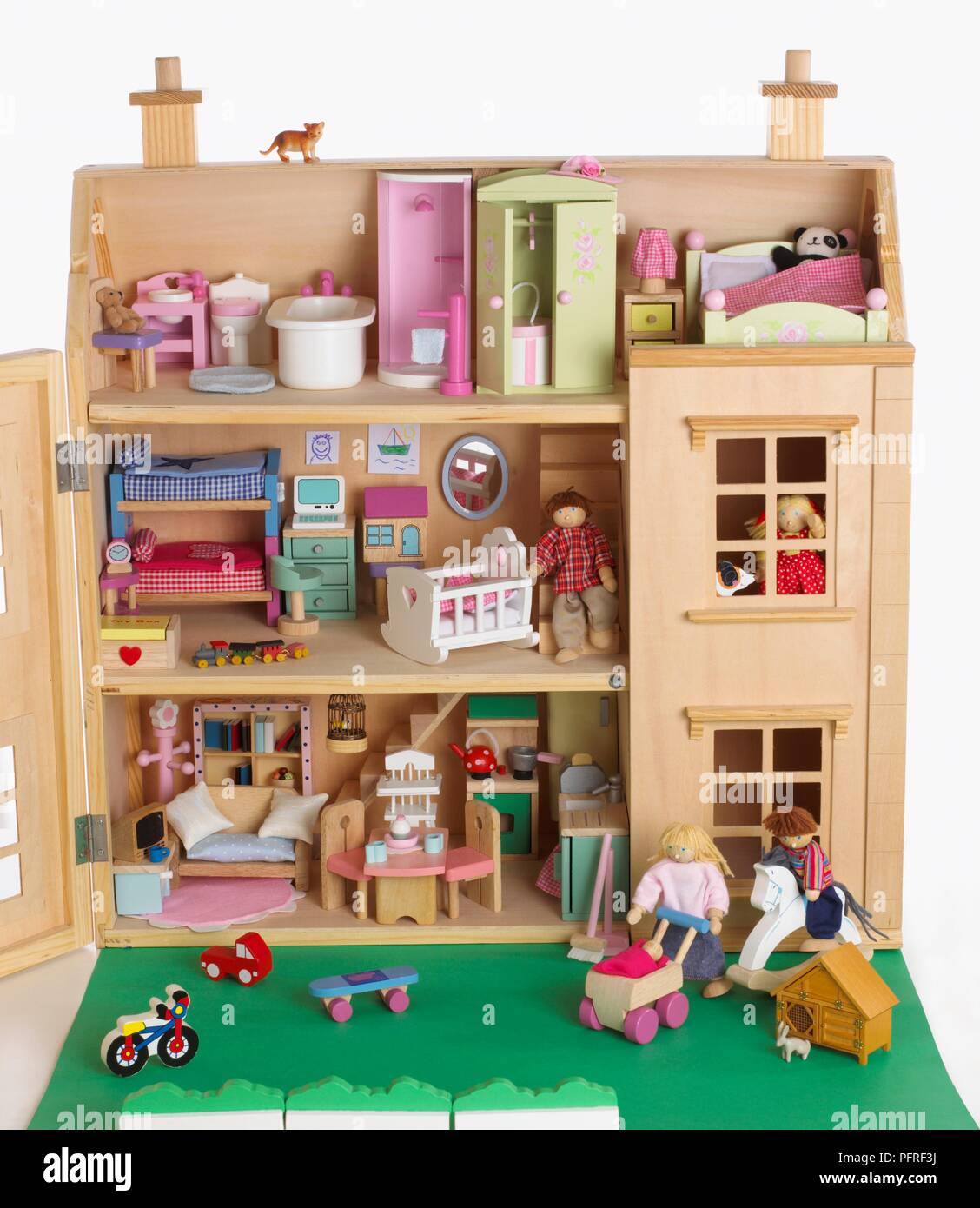 Rooms in doll's house, and garden Stock Photo Alamy