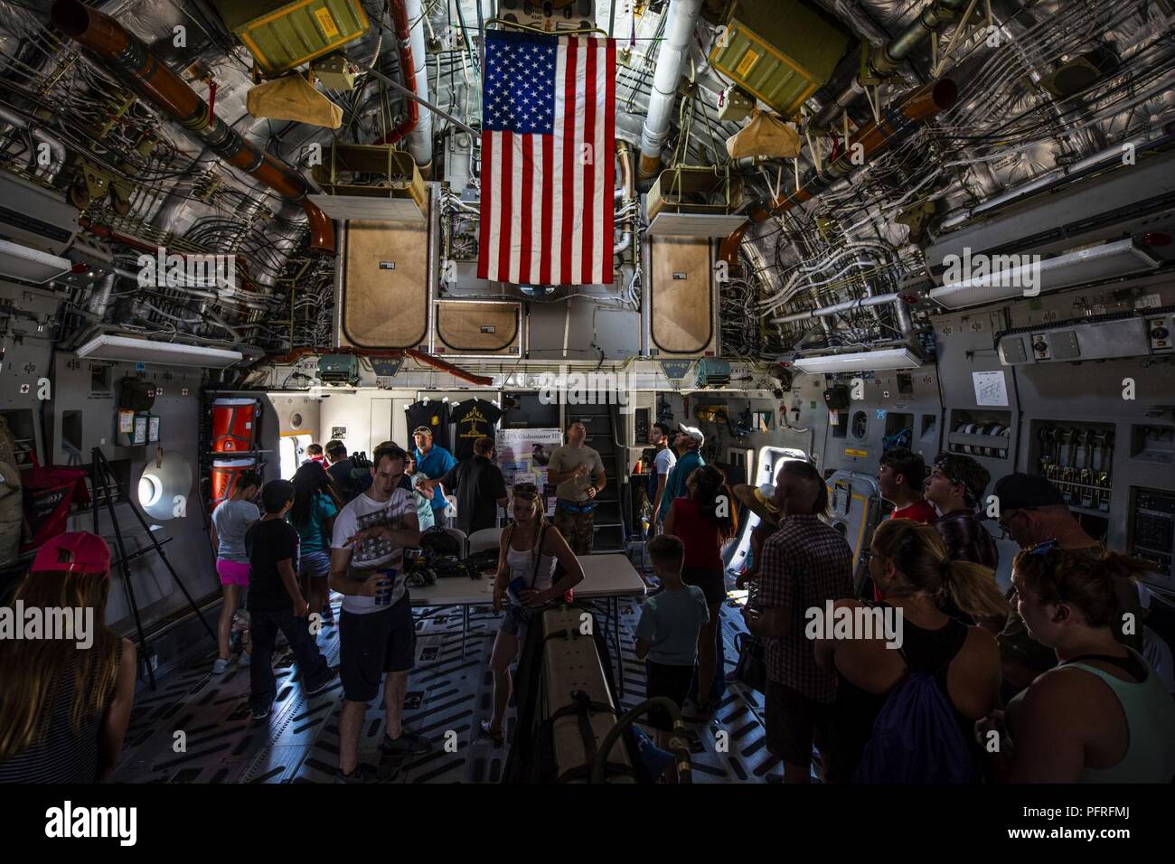 Attendees of the Cannon Air Show, Space and Tech Fest view the inside