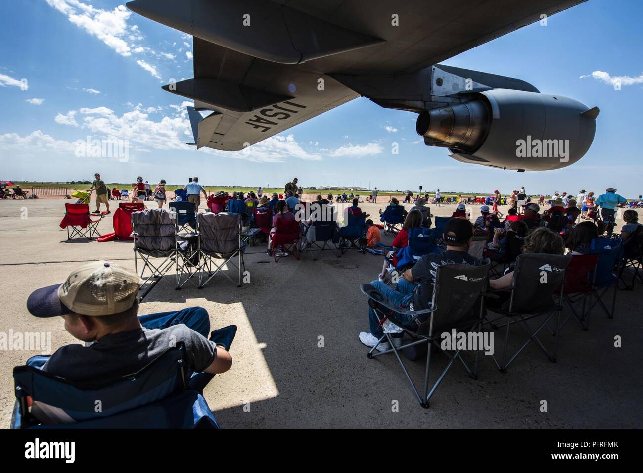 Attendees of the Cannon Air Show, Space and Tech Fest find shade under
