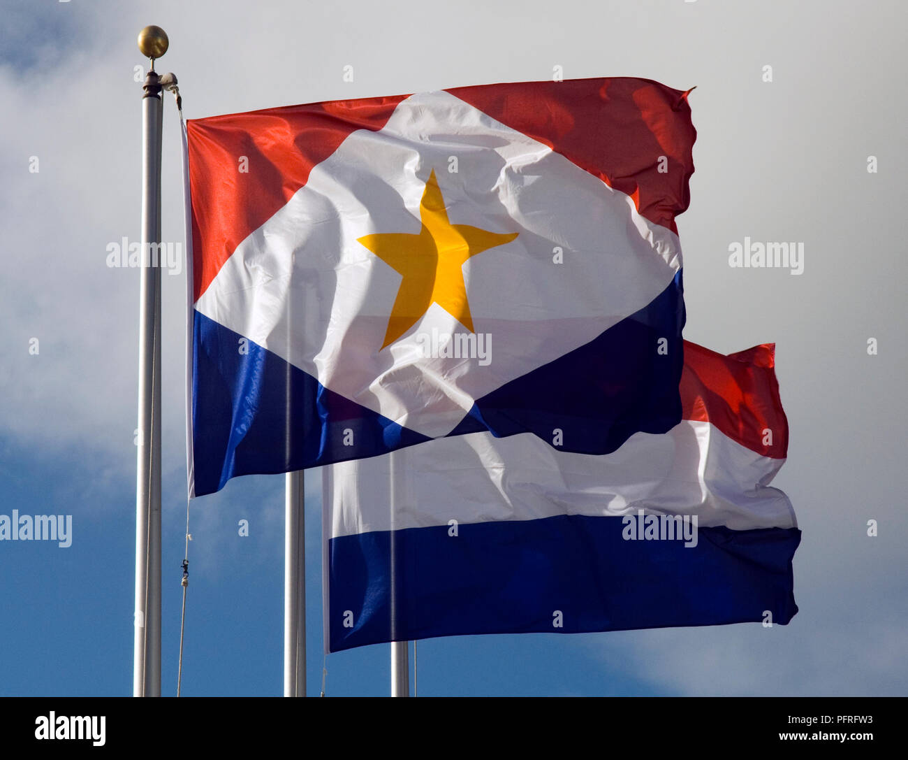 Leeward Islands, Saba, Saba flag and Dutch flag flying side by side Stock Photo