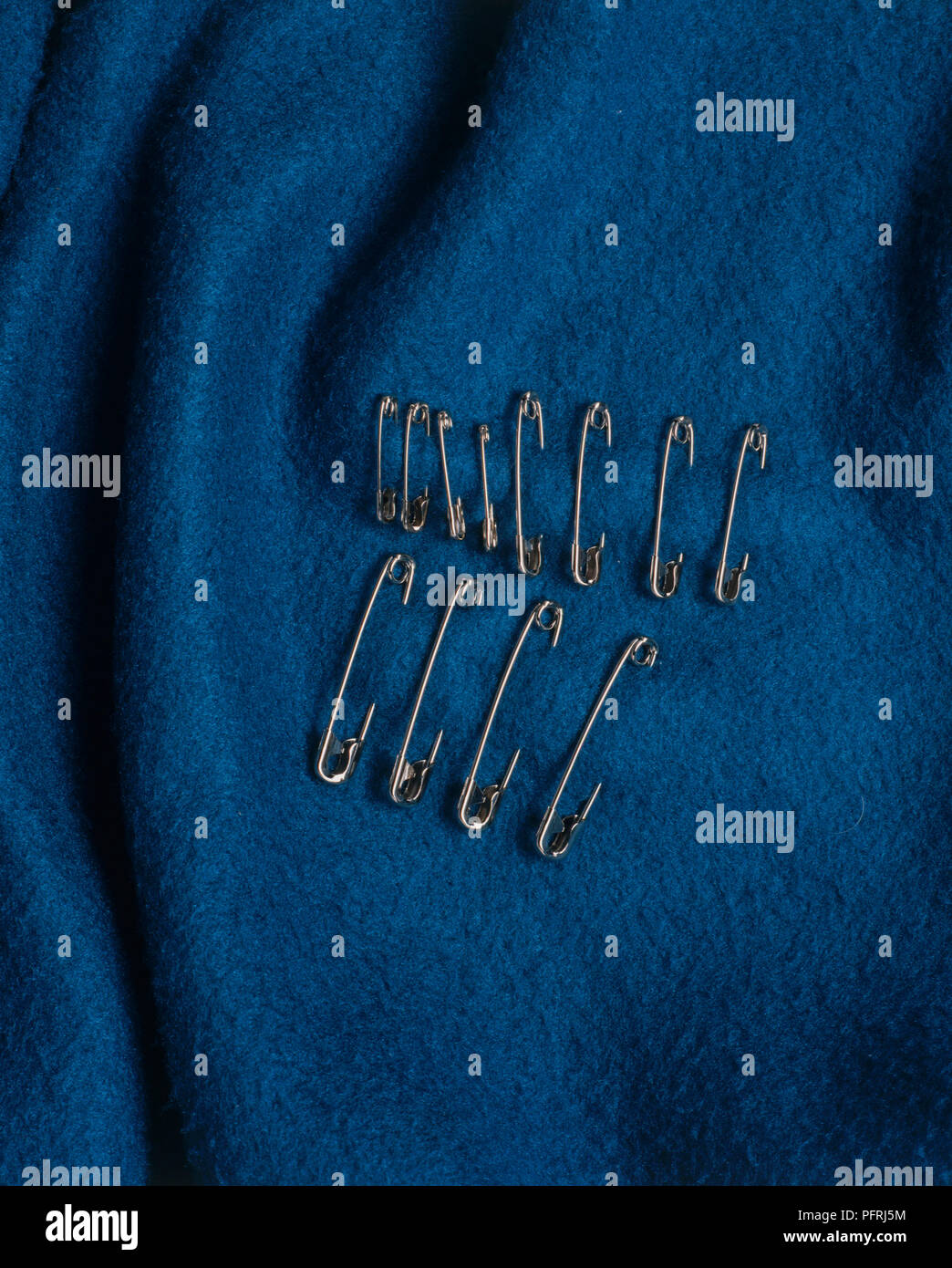 Safety pin fabric hires stock photography and images Alamy