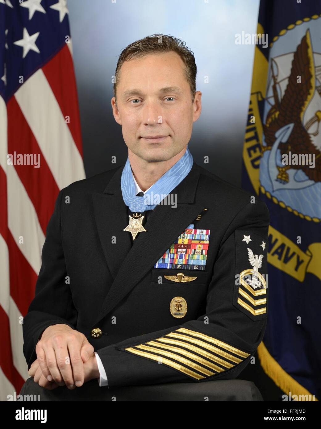 180525-A-SS368-007 WASHINGTON (May 25, 2018) An official portrait of retired Master Chief Special Warfare Operator (SEAL) Britt K. Slabinski taken May 25, 2018 at the Pentagon. President Donald J. Trump awarded the Medal of Honor to Slabinski during a White House ceremony May 24, 2018 for his heroic actions during the Battle of Takur Ghar in March 2002 while serving in Afghanistan. Slabinski is being recognized for his actions while leading a team under heavy effective enemy fire in an attempt to rescue SEAL teammate Petty Officer 1st Class Neil Roberts during Operation Anaconda in 2002. The M Stock Photo