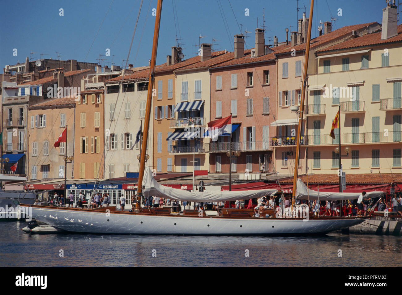 France, St-Tropez, passengers on boat in harbour Stock Photo