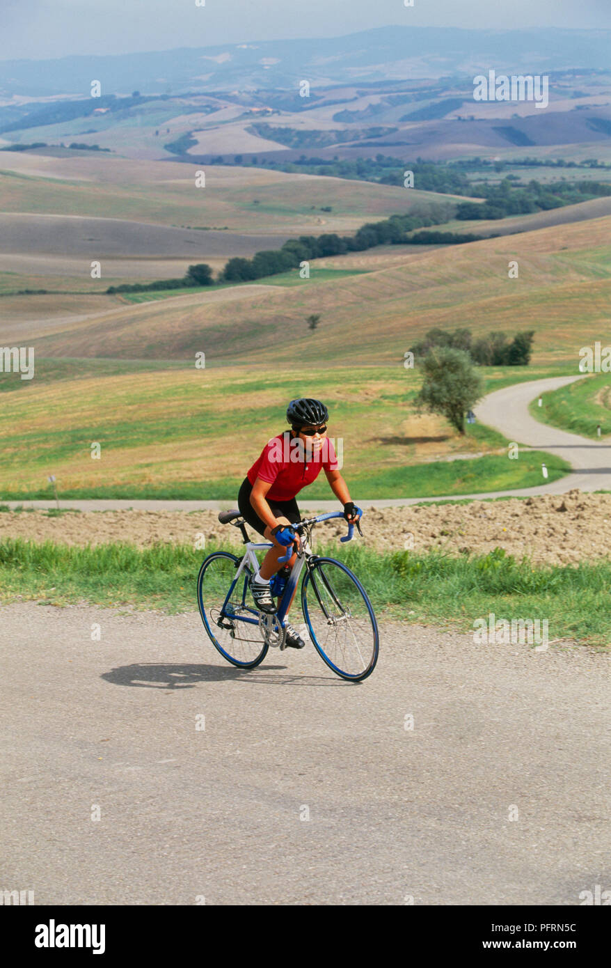 riding bike standing up