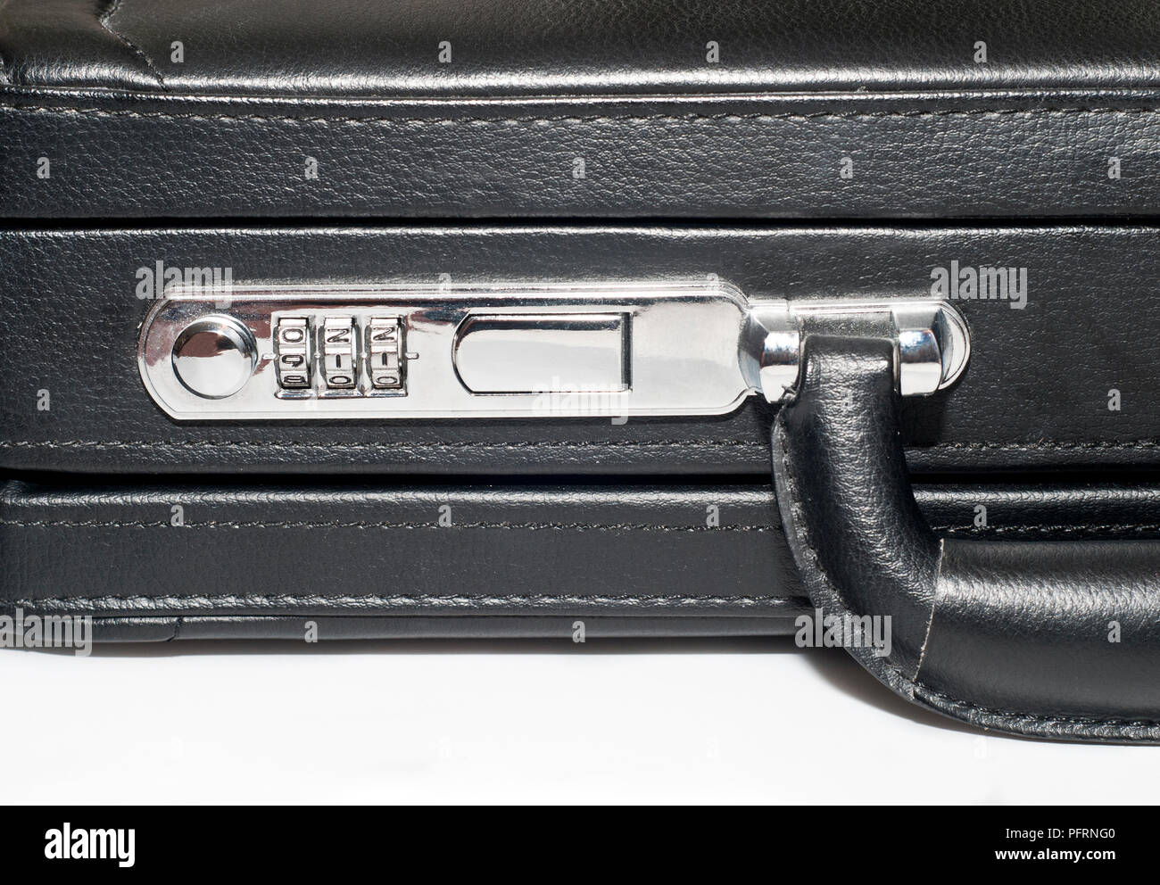 Black briefcase with 911 combination on the lock, close-up Stock Photo