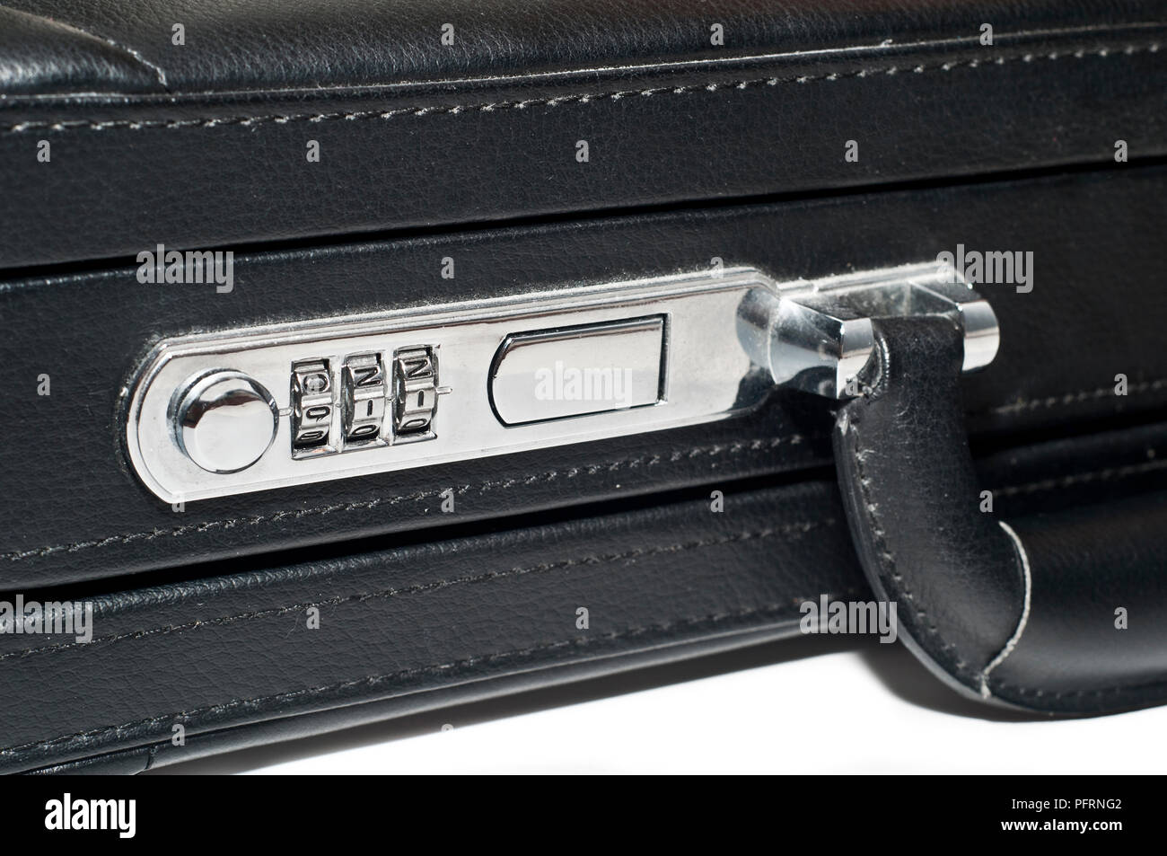 Black briefcase with 911 combination on the lock, close-up Stock Photo