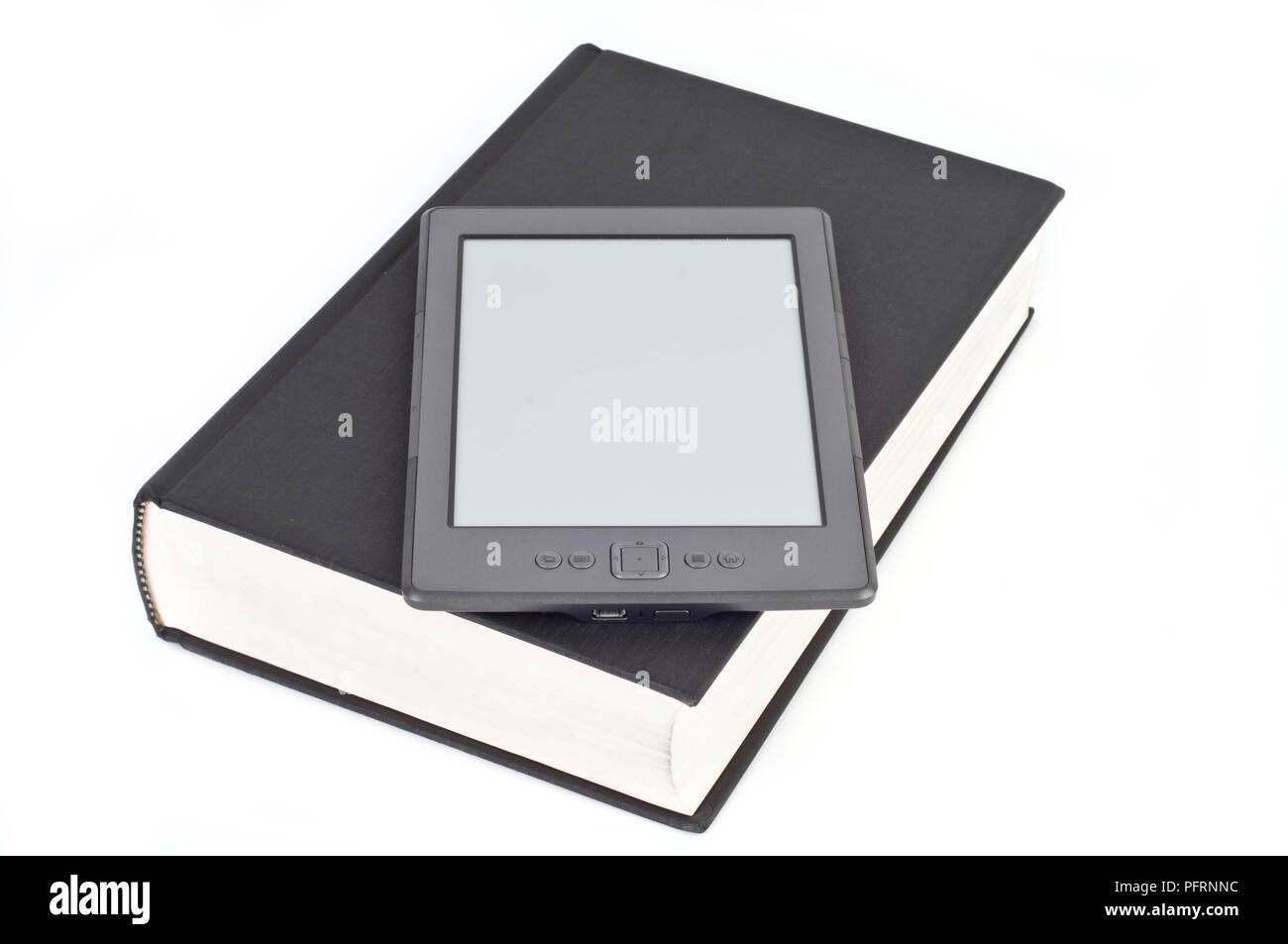 Electronic reader and hardback book Stock Photo Alamy